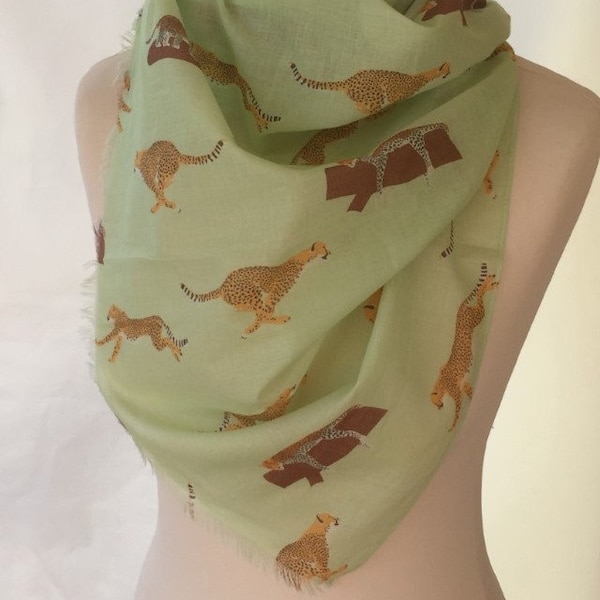 Leopard Print Scarf With  A Red And Green Trim