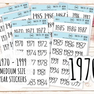May include: A set of black and white year stickers for 1970-1999. The stickers are medium size and feature a handwritten font. The text "1970-1999 Medium Size Year Stickers" is printed on the sheet.