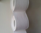 Minimalist bath decor. Small space furniture. Pure white toilet roll holder.