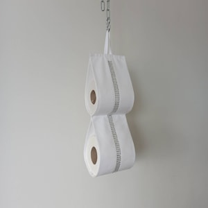 Porta carta igienica in tessuto a parete / 1 - 6 rotoli / Bianco o nero con nastro di diamanti argentati.