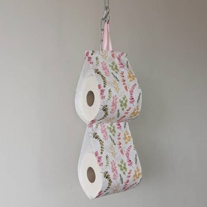 White fabric toilet roll storage, hanging leafs print bath storage, spare roll, small space organizer.
