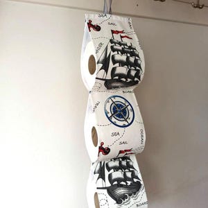 Boat, lighthouse print bath storage, beach house furniture, spare roll holder, toilet paper cover.