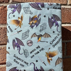 May include: A blue fabric dice bag with a variety of dragon and griffin illustrations. The bag has the text "Die Today You Will Not" and "Civility is Overrated" printed on it.
