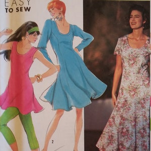 May include: A sewing pattern featuring two dresses. The first dress is a bright pink sleeveless dress with a scoop neck. The second dress is a light blue long-sleeved dress with a scoop neck. The third dress is a floral print dress with short sleeves and a scoop neck. The pattern is titled "Easy to Sew".