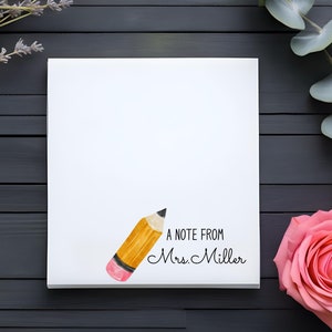 May include: A white notepad with a pencil illustration and the text "A note from Mrs. Miller".
