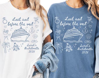 May include: Two white t-shirts with a blue jean t-shirt. The shirts have a white graphic design of a cruise ship with the text "Last sail before the veil" and "Sarah's Bachelorette 2025".