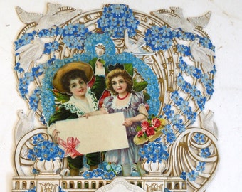 Large antique Victorian Valentine card Fold out die cut embossed gilt honeycomb pop up blue floral bird girl dove hat