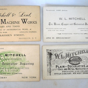 May include: Four vintage business cards for Mitchell & Lent, Eureka Machine Works, W.L. Mitchell, and W.L. Mitchell. The cards feature black text on a white background and advertise the companies' services, including die and tool making, metal work, japaning, and pressing and stamping.