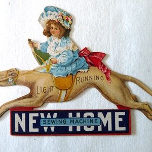 Antique New Home Sewing machine light running Victorian advertising trade card rae dog girl bonnet bow die cut ephemera paper