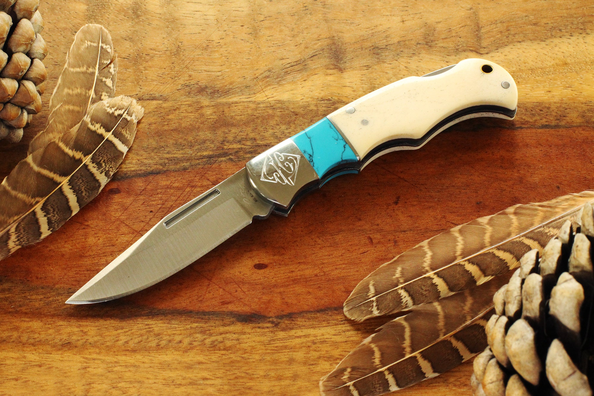 White Bone Lock Back Knife with Faux Turquoise