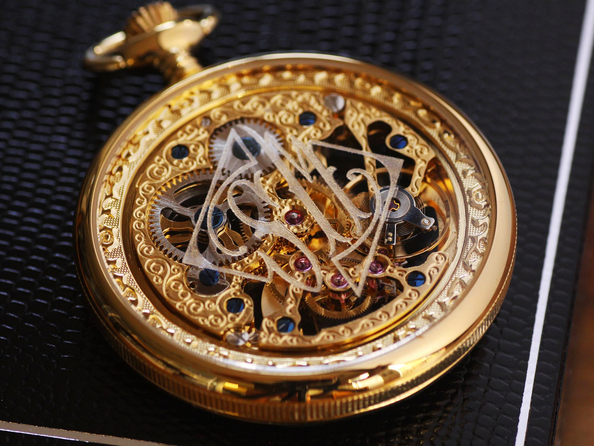 Gold skeleton pocket watch hotsell