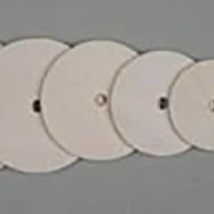 May include: A set of eight white round sanding discs of varying sizes.
