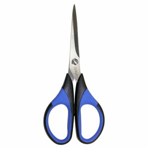May include: A pair of small, blue and black handled scissors with a silver blade. The scissors have the word "Sakrot" printed on the blade.