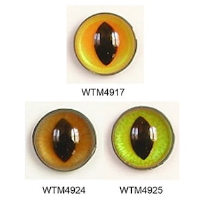 May include: Three plastic cat eyes with black pupils. The eyes are yellow, brown, and green. The eyes are labeled WTM4917, WTM4924, and WTM4925.