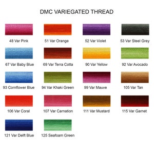 May include: DMC Variegated Thread colour chart displaying 12 different shades of embroidery floss. The colours include pink, orange, violet, steel grey, baby blue, terracotta, yellow, avocado, cornflower blue, khaki green, mauve, tan, coral, carnation, mustard, garnet, delft blue, and seafoam green.