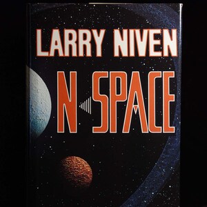 N-Space by Larry Niven c. 1990 TOR HC / DJ 1st Ed / 1st Printing Art by Dave Archer Bibliography included 0-312-85089-1