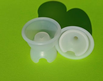 Silicone foreskin retainer with a frenulum notch