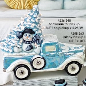 May include: A blue and white ceramic pickup truck with a snowman and a Christmas tree in the bed. The truck is 4.5 inches long and 10 inches wide. The snowman is 8.5 inches tall and 5.25 inches wide.