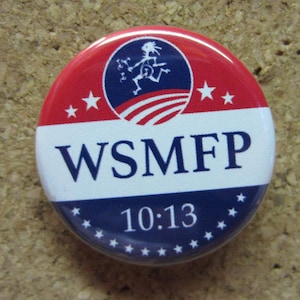 May include: A red, white, and blue button with a stylized figure and the text "WSMFP 10:13".