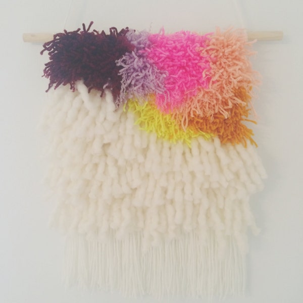 colorful handmade yarn wall hanging