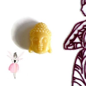 28 x 20 mm synthetic coral Buddha head bead