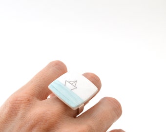 Ceramic ring. Ceramic jewelry. Illustrated ring. Paper boat