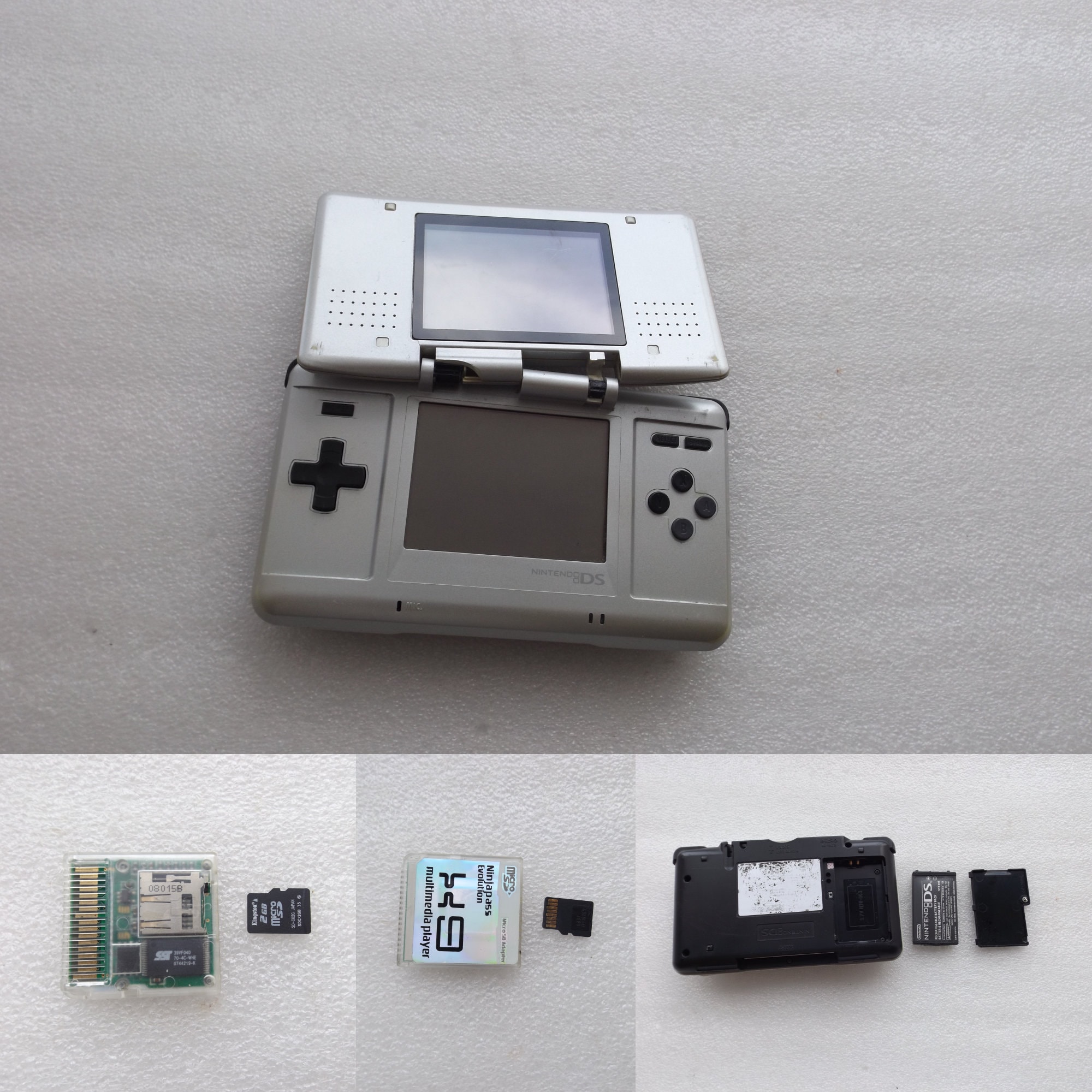 Nintendo DS With Battery and Adapter With 2 Gb Kingston