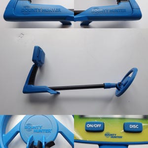Pode incluir: Um detector de metais Bounty Hunter azul e preto com uma haste longa, uma bobina de busca circular e uma caixa de controle com botões ON/OFF e DISC. A marca Bounty Hunter está gravada na estrutura de plástico azul e na bobina.