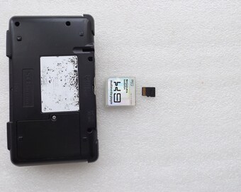 Nintendo DS With Battery and Adapter With 2 Gb Kingston