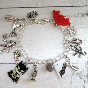Big Bang Themed Charm Bracelet with tibetan silver perspex and enamel charms