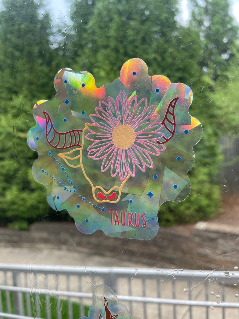 Taurus Zodiac Suncatcher: Holographic Rainbow Window Sticker, photo 1 of 10