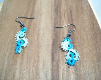 Small dainty hand tatted earrings  in hues of blue with dark silver tone ear wire.