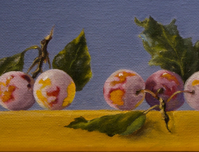 May include: A still life painting of plums with green leaves on a blue and yellow background. The plums are a light purple color with yellow and red highlights.