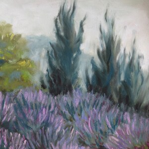 May include: A pastel painting of a field of lavender flowers with tall, dark green trees in the background. The sky is a light gray, and the trees are silhouetted against the sky.