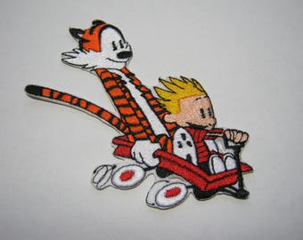 Parche bordado de Calvin y Hobbes en el paseo en carreta, Amigos