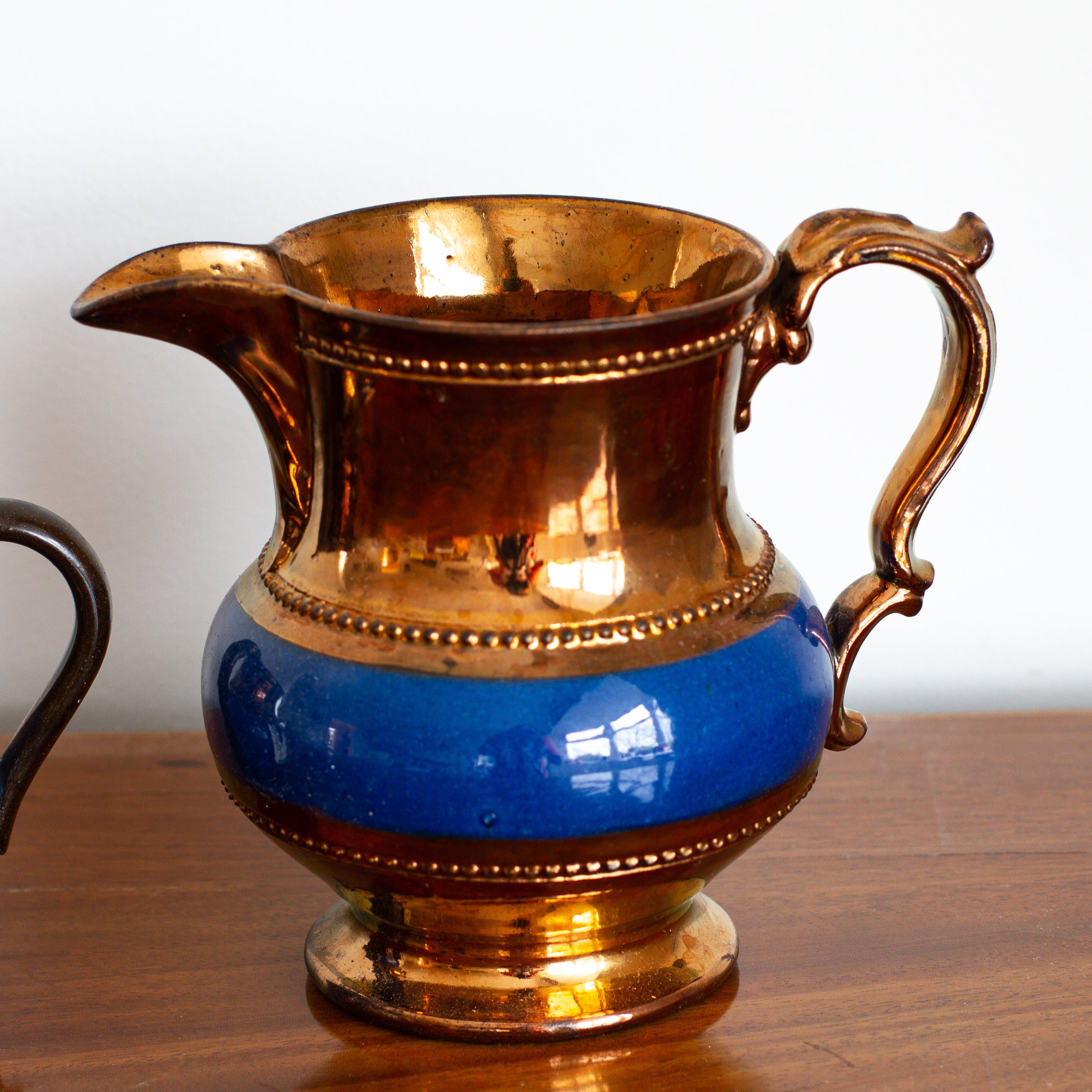 A Pair of Antique Copper Lustre Ware Jugs with Blue Details Etsy