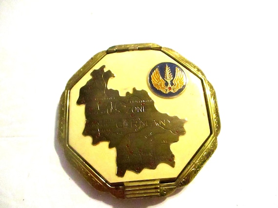 1946 to 1953 US zone Occupied Germany USAF Europe compact. Brass enamel.