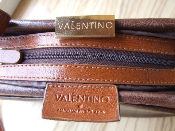 Designer mario valentino top