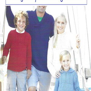 May include: A family of four wearing knitted sweaters in various colors. The sweaters feature different cable knit patterns. The family is standing on a boat with a blue sky and white clouds in the background. The image includes the text "Family Jumper Knitting Pattern C91".