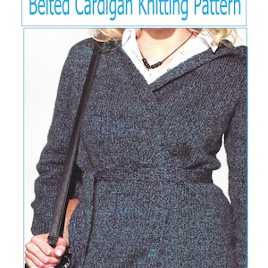 May include: A blue and black belted cardigan knitting pattern with a V-neck and a hood. The pattern number is K305.