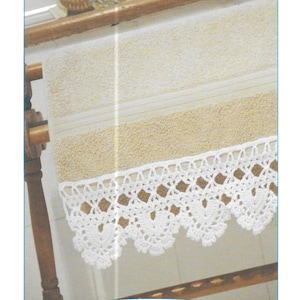 May include: White crochet lace edging on a beige towel. The crochet pattern features a repeating design of small flowers and squares. The image includes the text "H127".