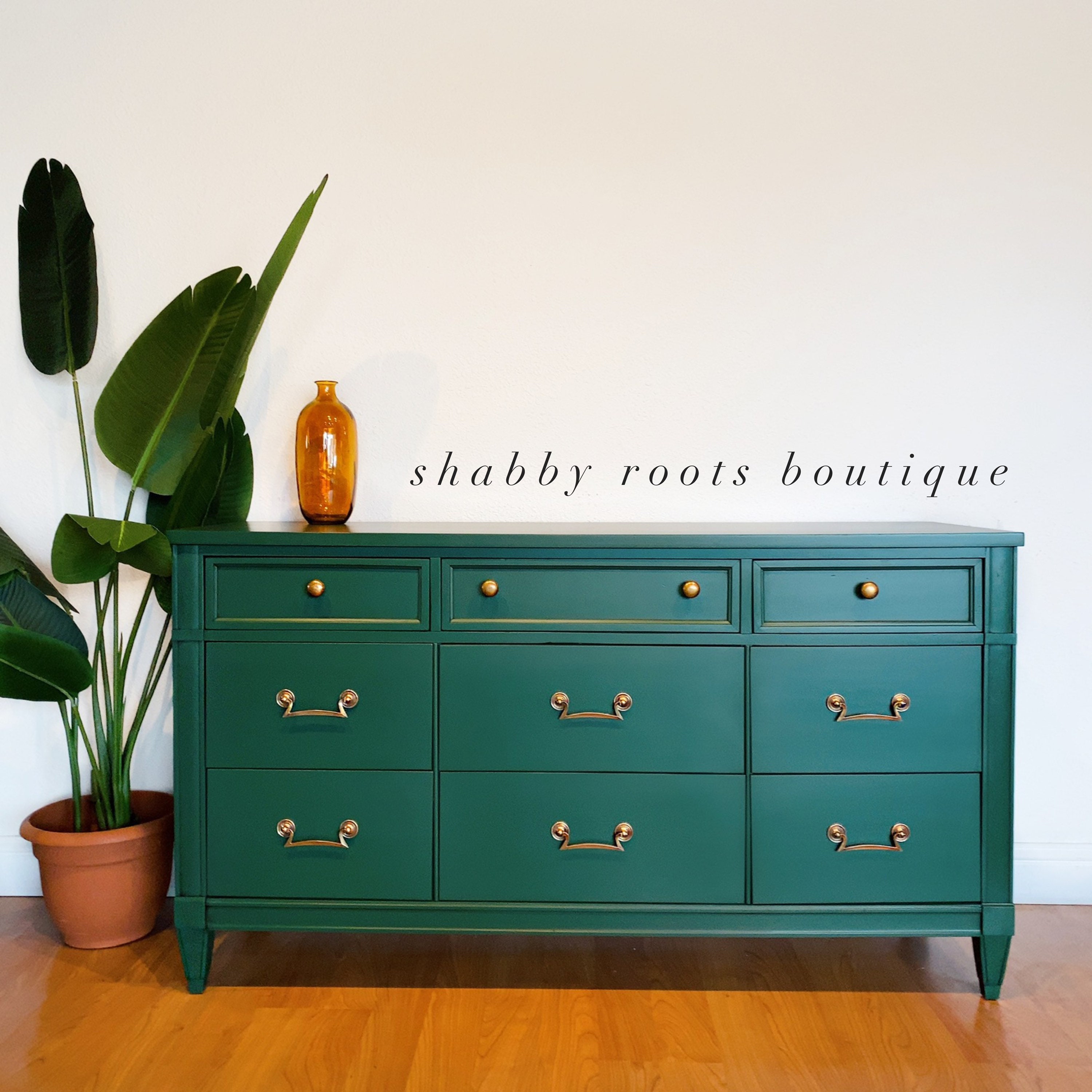 Mid Century Green Dresser of Nine Drawers - AptDeco