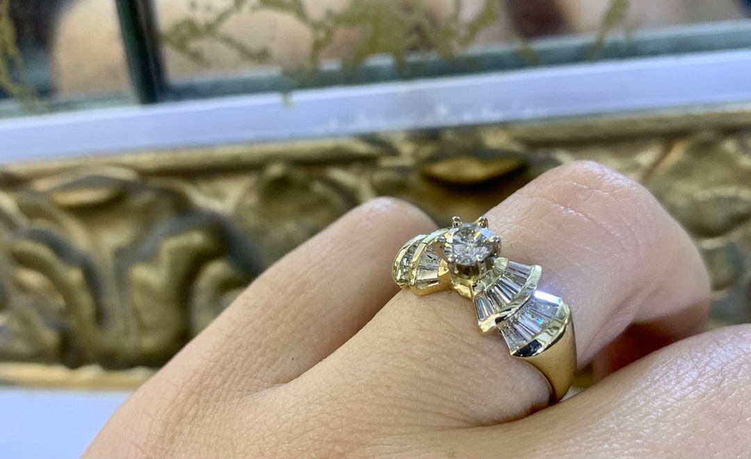 Yellow gold baguette diamond best sale ring