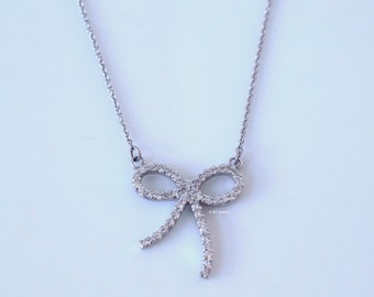 Sterling Silver Diamond Bow Pendant 11x15mm Sterling Silver Diamond Bow Pendant 11x15mm