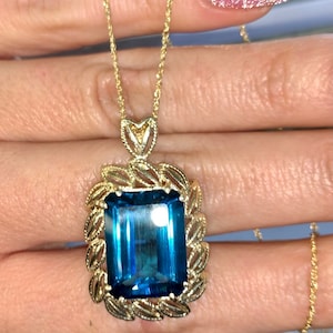14kt Yellow Gold Emerald Cut London Blue Topaz Pendant