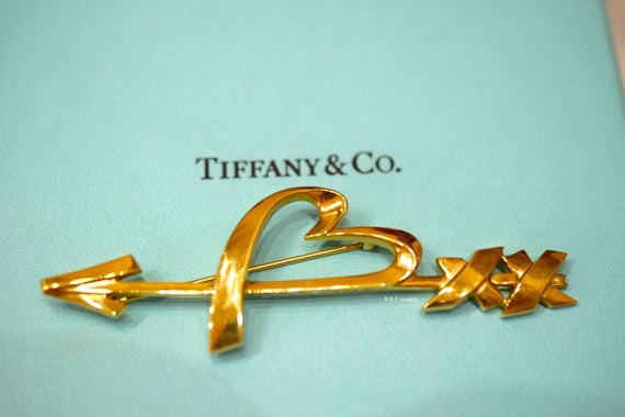 Paloma's graffiti arrow ring deals