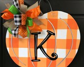Buffalo Check Orange Pumpkin Door Hanger