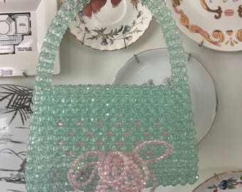 Enchanted / Giselle, bolso de mano con cuentas, menta y rosa pálido