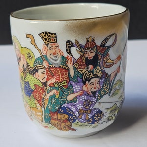 Oriental Porcelain Tea Cup with Full Color Images, Gold Trim and Interior Written Characters - Bottom Signed