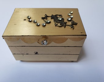 Gold Metal Cantilever Jewelry Box with Floral and Rhinestone Lid Detail Scalloped Edge and Magenta Interior